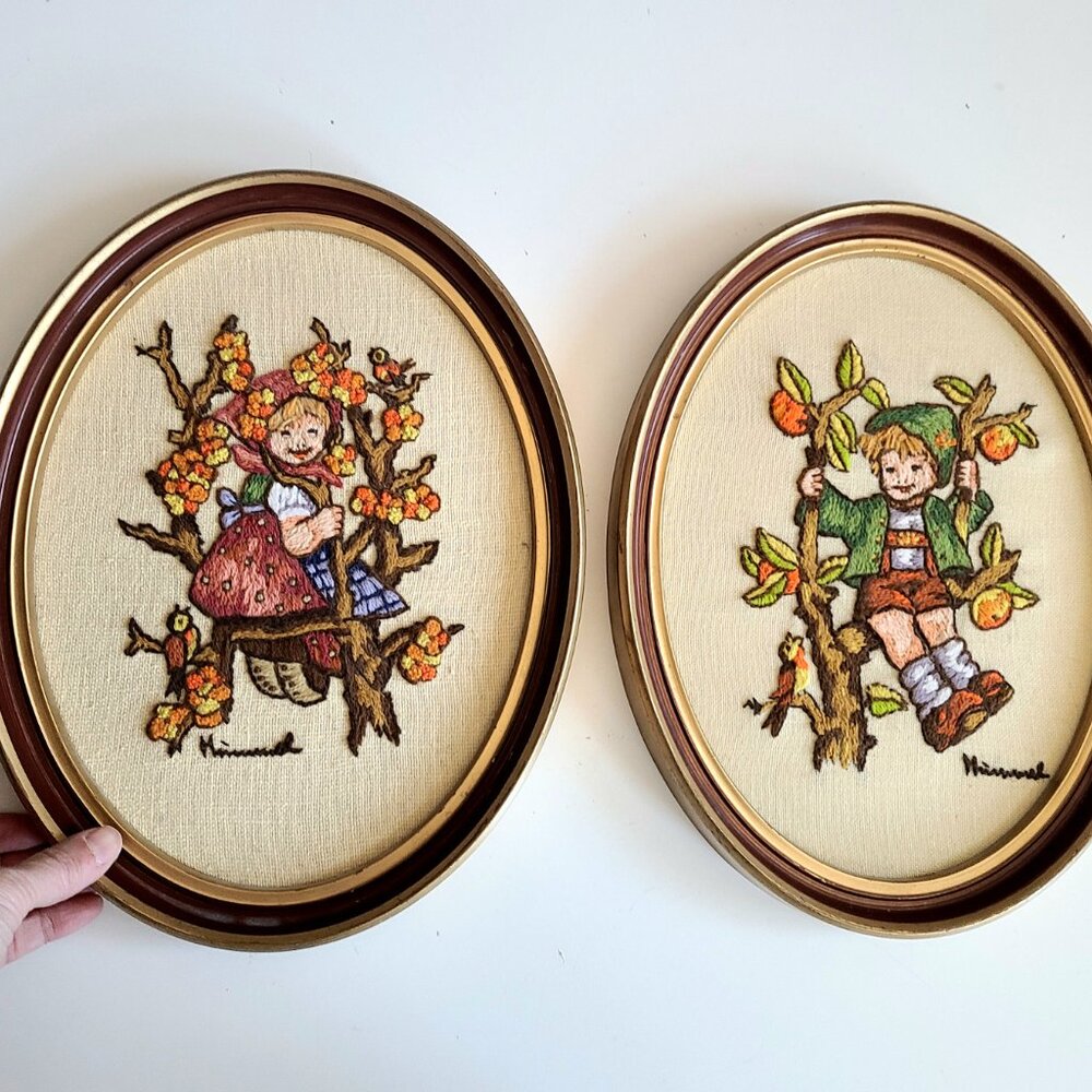 Set of 2 large Hummel 1970s oval framed crewel embroidery pictures w/kids.